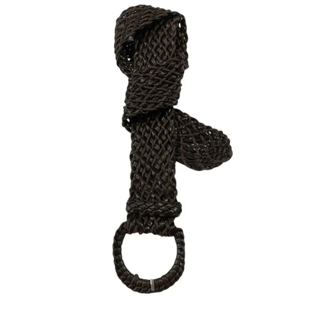 Unbranded vintage women's faux leather braided woven belt.